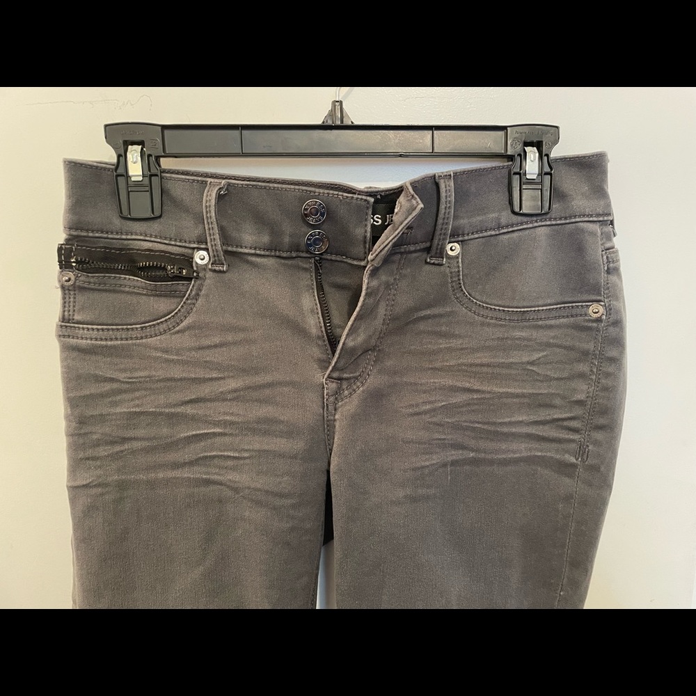 Express Jeans/ Jeggings with black zipper and nice button details.